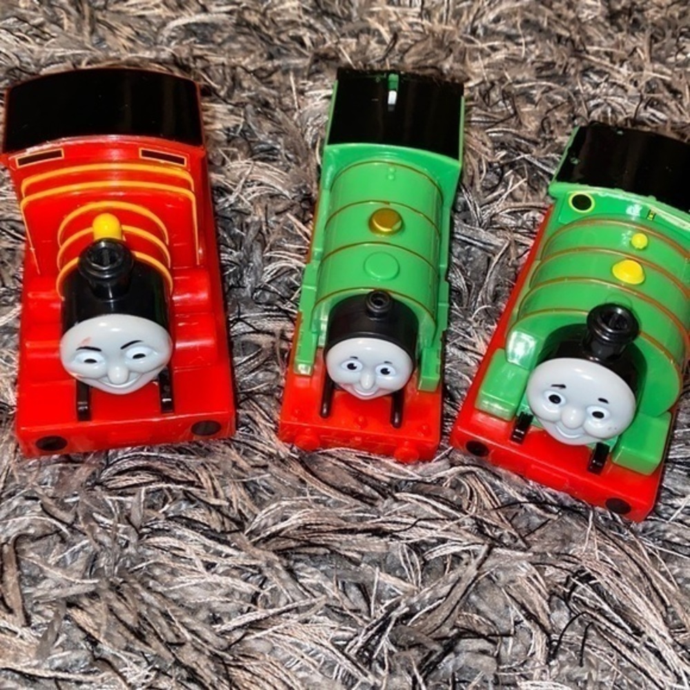 Thomas the train toy bundle 2 of the items are 2009 vintage the middle is newer